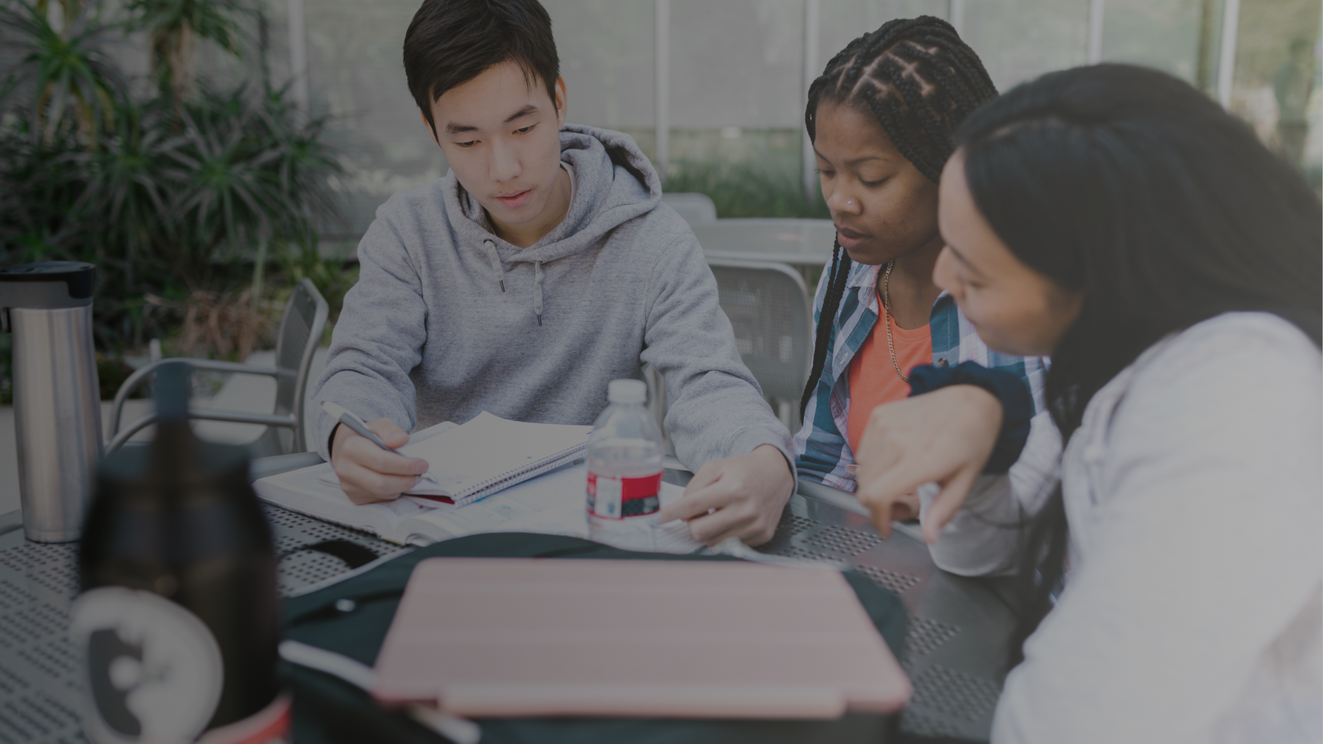 Students pictured at a table.